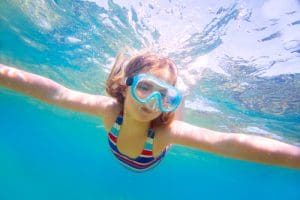 Look how the sun hits your body while swimming and playing...